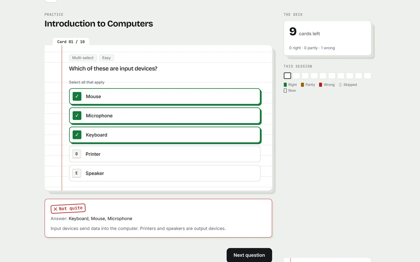 Feedback after answering: Mouse, Microphone and Keyboard marked correct in green, with a 'Not quite' box explaining that printers and speakers are output devices.